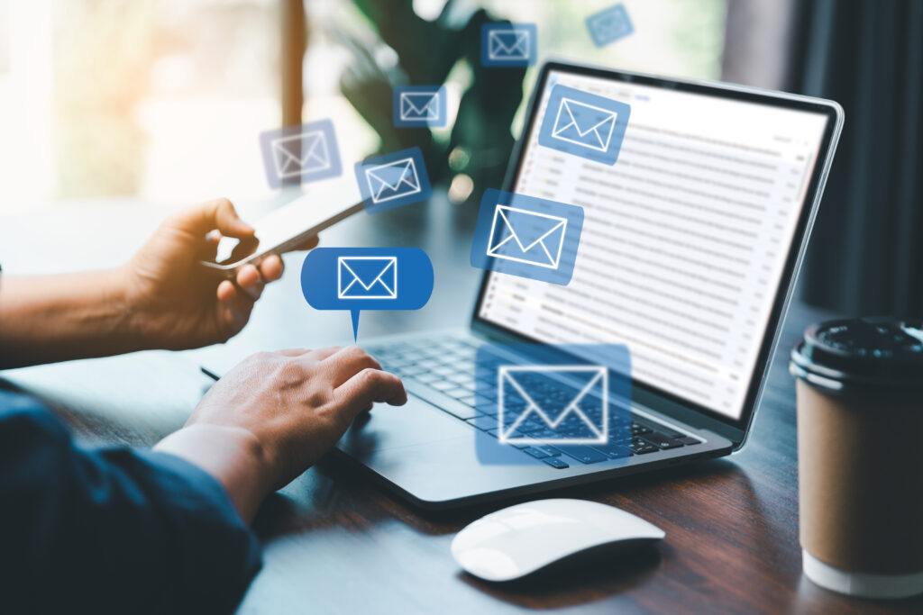 email marketing concept receive new message message online chat social text female hand working with virtual postal envelopes sketch on blurred office background customer support hotline people